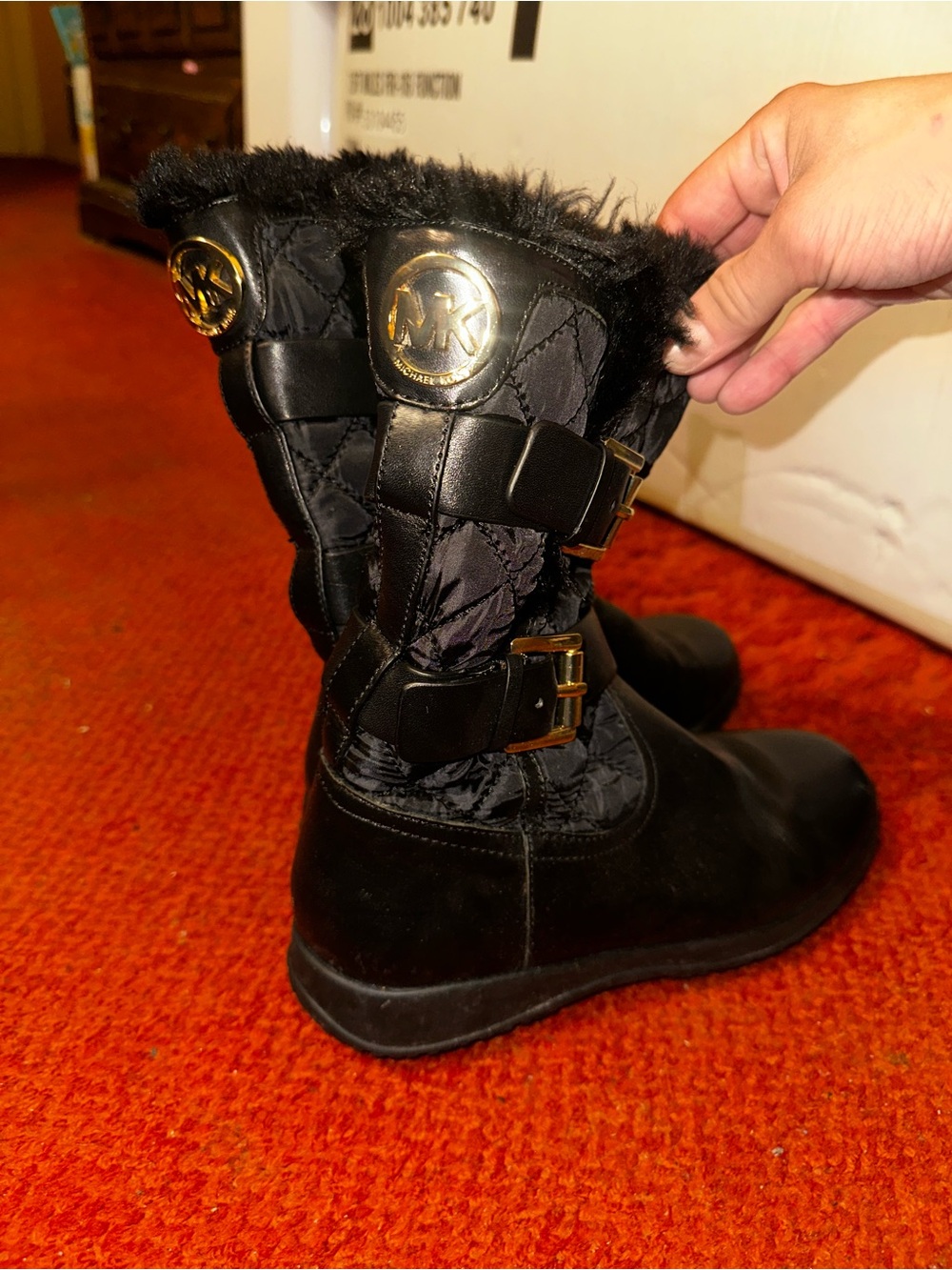 Michael Kors Black Quilted Winter Boots with Fur Trim and Gold Accents